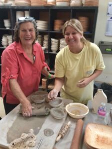 Beverly McNeil and Amanda at Prodigal Pottery's studio during a class for Lovelady graduates in 2023.